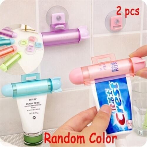 2PCS ABS Cute Rolling Squeezer Toothpaste Dispenser Tube Partner Hanging Holder Press Rolling Holder Bathroom Accessories