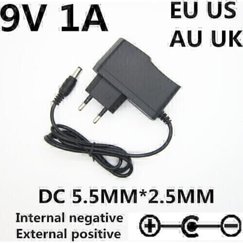 1pcs 9 v Volt 1a power supply adapter 9V 1A 1000ma universal power adapter reverse polarity Outside positive inside negative