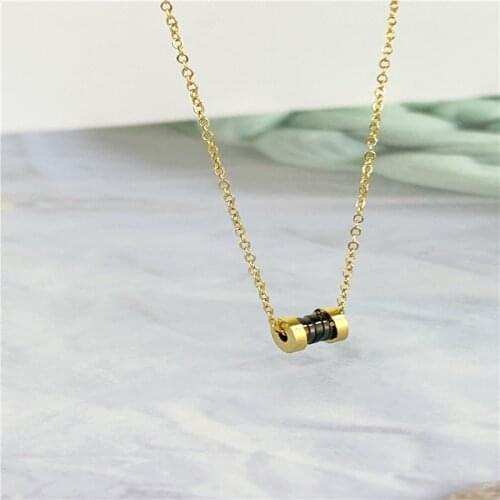 Europe and the United States small waist stainless steel necklace womens 18K gold cylinder retro pendant small jewelry