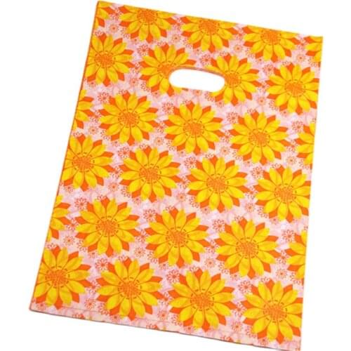 New Design Hot Sale Wholesale 100pcs/lot 25*35cm Fashion Yellow Sunflower Package Bags Plastic Large Gift Packaging