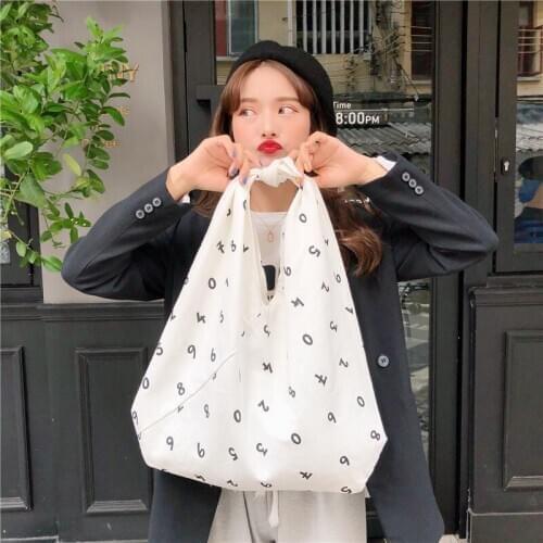 2020 new wave new personality strap design wild large capacity digital shoulder bag student environmental protection canvas bag