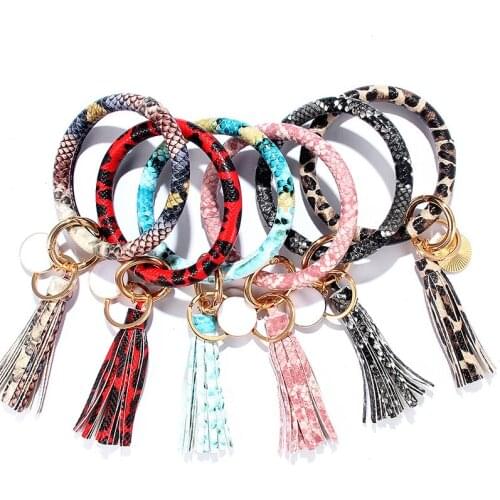 21 Colors for choice Popular Leatherwear Fashion Pu Tassel Bracelet Key Chain Disc Pendant Snake Skin SPORTS BRACELET