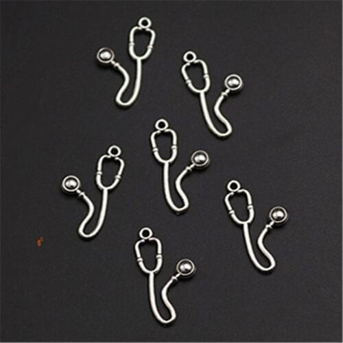 WKOUD 20pcs Silver Color mini stethoscope charm alloy pendant hip hop bracelet earrings DIY metal jewelry handmade A1180