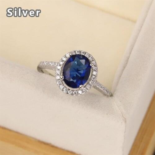 European and American S925 Silver Ring womens fashion diamond inlaid with oval egg shaped blue Topaz color gem engagement gift