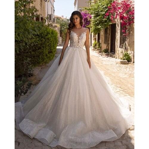 Gorgeous Princess Wedding Dress 2021 A-Line Sheer Neck Lace Appliques Sequins Button Sweep Train Bridal Gown Vestidos De Noiva