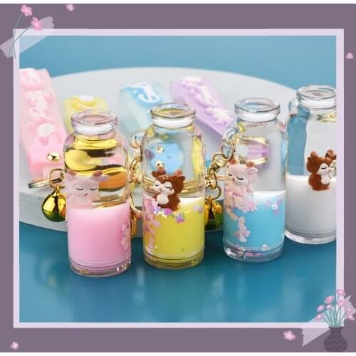 Fashion Creative Elk Into The Oil Drift Bottle Keychain Cartoon Fun Floating Charm Keychain Girl Backpack Pendant Keychain