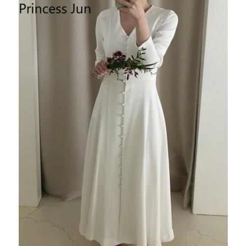 Niche Elegant V-neck Single-breasted A Line Dress Slim Waist Solid-color Large Swing Midi Dress French Retro Long Sleeve Dress