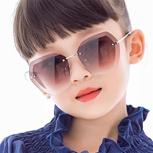 2021 Rimless Top Quality Sunglasses Custom Kids Sunglasses Children UV400 Safety Kids glasses KS010