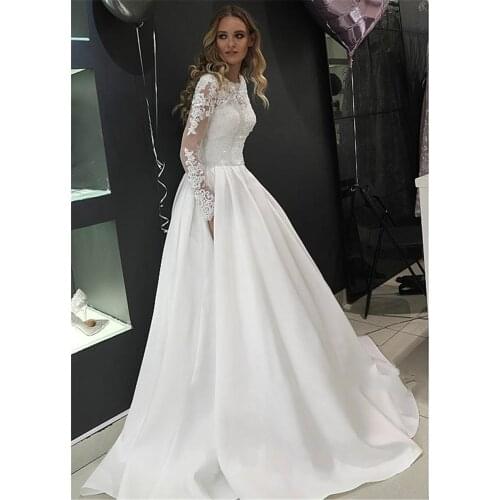 Cover High Section A-line Wedding Clothing Long sleeves Crystals Bridal dress Key Bottom Wedding Clothing Vestido De Noiva