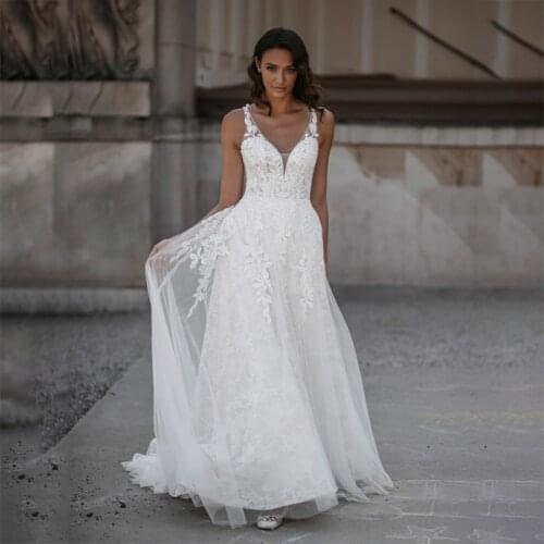 Bohemian Beach Boho V-Neck A-Line Appliques Wedding Dress Lace Bridal Dress Floor Length Criss Cross Backless Robes De Mariage