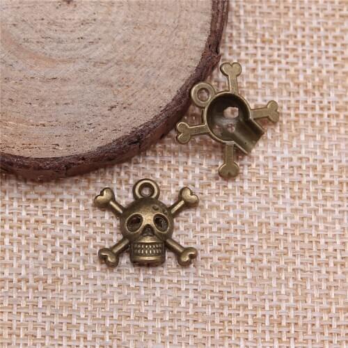 Free shipping 65pcs 17x15mm antique bronze Skeleton charms diy retro jewelry fit Earring keychain hair card pendant accessories