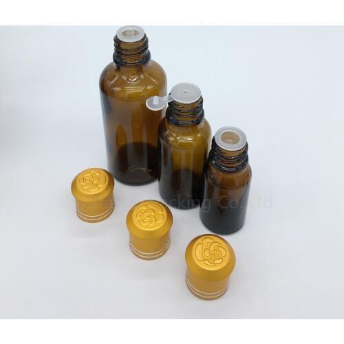 Free shipping 5ml-100ml amber Glass Bottle, Vials Essential Oil Bottle with Decorative pattern cap 100pcs