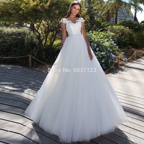 2021 Ball Gown Wedding Dresses A Line Cap Sleeves V Neck Lace Appliques Sheer Buttons Back Bridal Wedding Gowns Vestido De Noiva