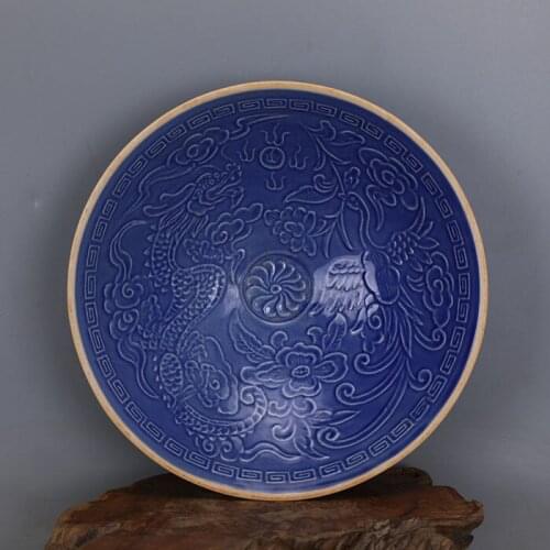 Song Dynasty Ding kiln blue glaze carved dragon and phoenix hat bowl