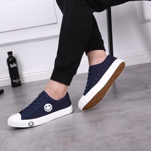 Spring And Summer New Mens Shoes Solid Color Non-Slip Sneakers Student Breathable Casual Shoes Wild Smiling Couple Canvas Shoes