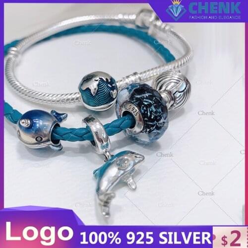 WAVY DARK BLUE MURANO GLASS OCEAN MOMENTS MURANO GLASS SEA TURTLE DANGLE CHARMEASHELL CLASP TURQUOISE BRAIDED LEATHER BRACELET