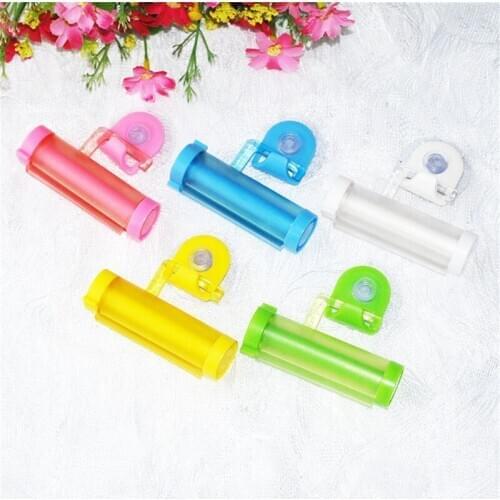 Creative 1 PC Rolling Squeezer Toothpaste Dispenser Tube Partner Sucker Hanging Holde Distributeur Dentifrice 5colors