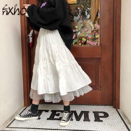 Verão New Korean Version of the college Womens skirt Wind mesh stitching skirt female students Loose and versatile mid-length