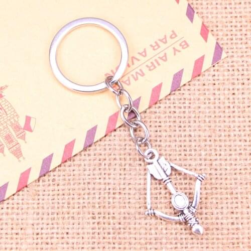 20pcs New Fashion Keychain 20mm crossbow bow Pendants DIY Men Jewelry Car Key Chain Ring Holder Souvenir For Gift