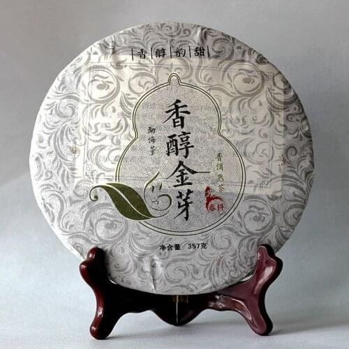 Yunnan Pu'er tea mellow tea golden bud Pu'er 357g tea cake Menghai flavor