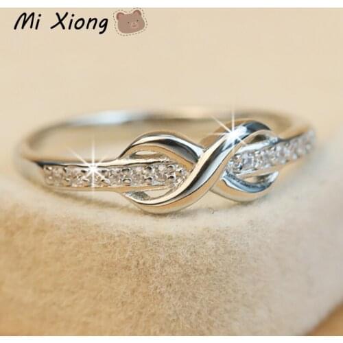 Mi Xiong s925 sterling silver designer original Korean winding crystal ring light luxury compact exquisite charm ladies jewelry