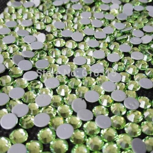 Extremely shiny hot fix loose flat back crystal ss20 peridot color with 1440pcs each pack ,14 cutting facets stones free ship