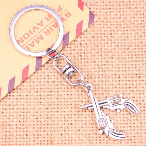 20pcs New Fashion Keychain 31*23 mm crossed pistols revolvers western Pendants DIY Men Jewelry Car Key Chain Souvenir For Gift