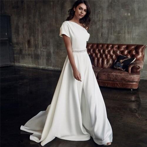 Elegant One Shoulder Wedding Dresses 2021 A-Line Backless Satin Short Sleeve Simple Bridal Gown With Crystal Belt Sweep Train