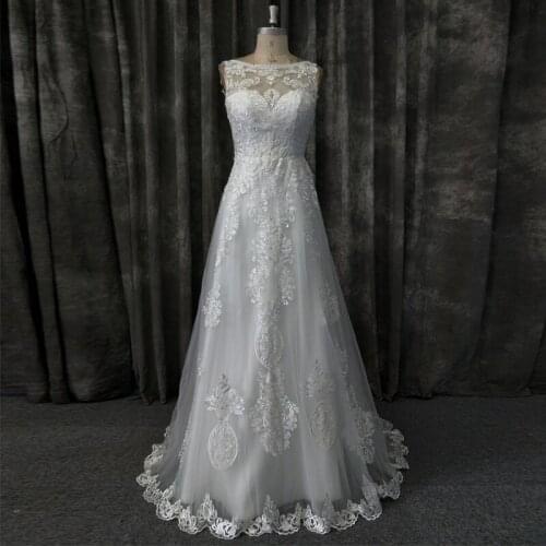 Charm Ivory Wedding Dress with Free Veil Sheer Bateau Neck Sleeveless Lace Appliques Tulle Bridal Gowns
