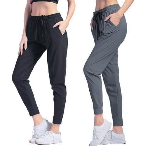 Jogger Pants Slim Fit Trousers Female Sportswear Nylon Quick Dry Running Pants Pocket Yoga Pants Loose Gym Sport Pants Leggins