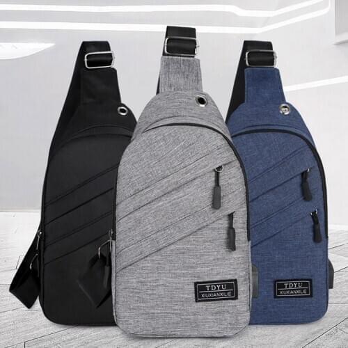 USB Charging Shoulder Bag Anti-theft chest bag casual waterproof diagonal bag version of the headset hole bags