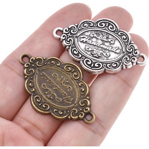50Pcs/lot 4.10x2.5cm Vintage Flower Printed Handmade Labels Antique Silver Letter Garment Label For Diy Sewing Materials