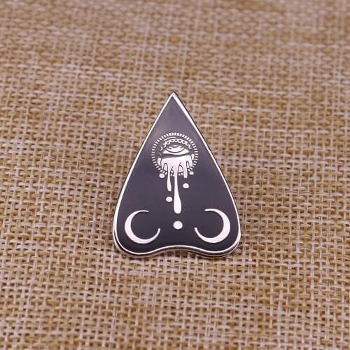 Mysterious enamel pin