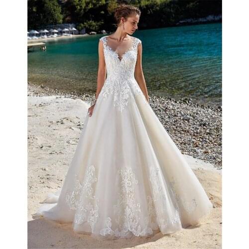 Beach Wedding Dresses A-line Cap Sleeves Tulle Appliques Lace Boho Dubai Arabic Wedding Gown Bridal Dress Vestido De Noiva