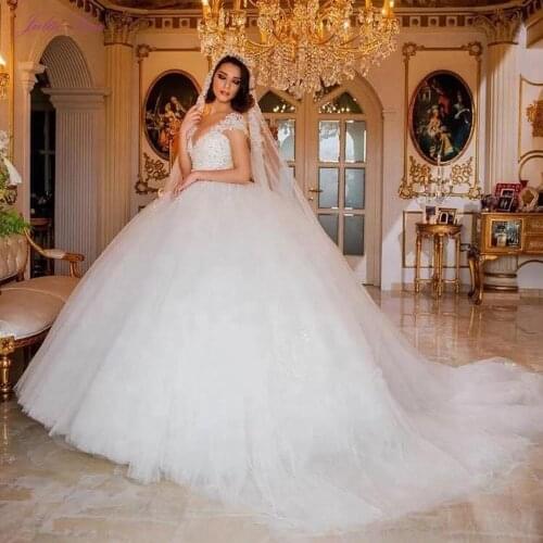 Julia Kui Gorgeous Ball Gown Wedding Dress Deep V Neckline With Puffy Skirt