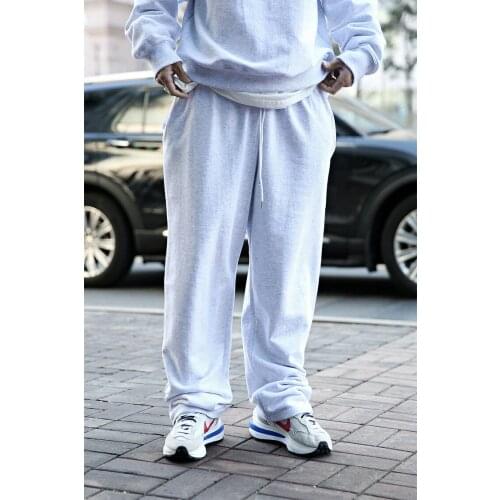 Big fashion brand mens and womens new solid color lace up loose straight tube trend inclined side pocket sports casual pants e