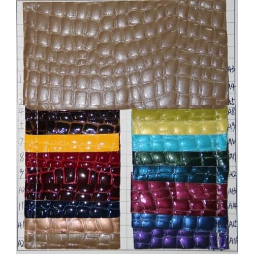 Shiny leather material free shipping 10 yards embossed Crystal stone pattern synthetic PU leather/ faux handbag leather fabric