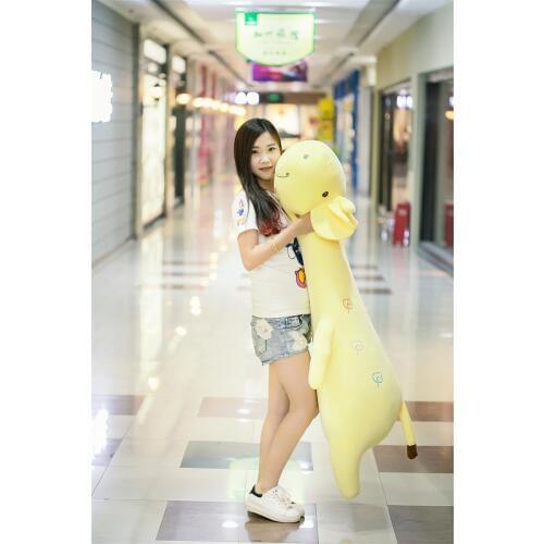 Huge plush lying giraffe toy long soft yellow cartoon giraffe pillow doll gift about 130cm 2613