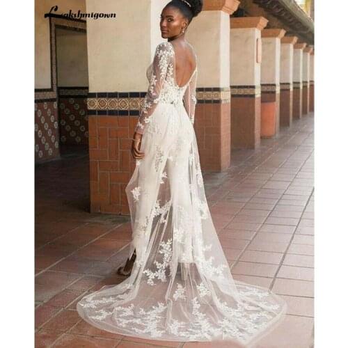 Lace Appliques Wedding Jumpsuit with Wrap Train 2020 African Nigerian Plus Size Bridal Gowns Garden Holiday Wedding Dress