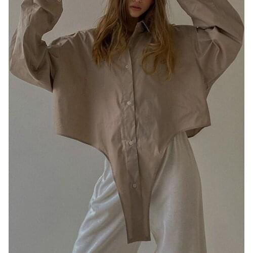 Fashion Lady Street Style Buttons Up Shirt Tops Sexy Summer Women Sleeveless Turn Down Collar Solid Irregular Hem Loose Blouse