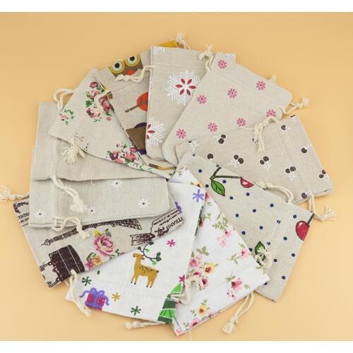Wholesale 50pcs/lot 10x14cm Cotton Bags Favor Random Mixed Drawstring Pouch Gift Bag Cute Charms Watch Jewelry Packaging Bags