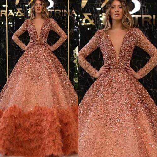 Amazing A Line Sparkle Prom Dresses with Feathers Deep V Neck Evening Gowns Long Sleeves Sequined Celebrity Dress