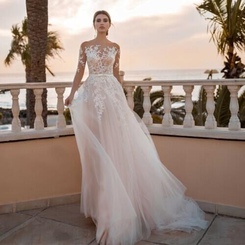 Half Sleeves Blush Color Tulle Wedding Dress with See Through Lace Applique Button Sexy Bridal Dress vestidos de casamento