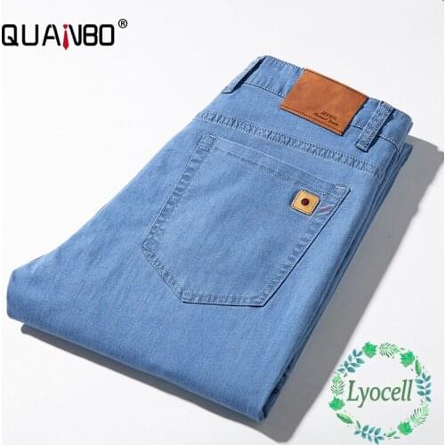 QUANBO Brand Summer Thin Lyocell Jeans Men Business Casual Light Blue Stretch Denim Pants Male Brand Trousers Large size 42 44