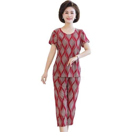 Summer 2021 New Middle-aged Mother Suit Loose Two-piece Women Plus Size 5XL Suit Short sleeve Top + 7 Points Pants Womens Suit
