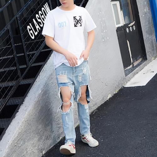 Influx male summer super big hole leaking knee nine 9 points jeans men and women couple models Korean version of thin pants