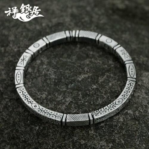 Fine silver quartet of carve patterns or designs on woodwork restoring ancient ways couples in nostalgic bracelets