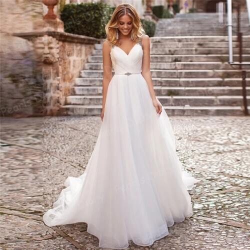Elegant Spaghetti Straps A-line Wedding Dresses 2021 Rhinestones Robe de Mariee Custom Made Backless Organza Bridal Bride Gowns