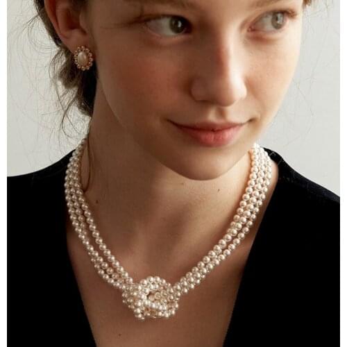 Japan and South Korea East Gate designer multi-layered pearl collarbone necklace female knot pearl necklace new lady style