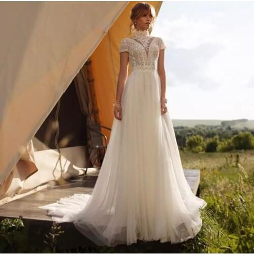 Bohemian Wedding Dress A-Line High Neck Cap Sleeve Chiffon Lace Appliques Backless Floor Length Sweep Train Bride Gown 2021
